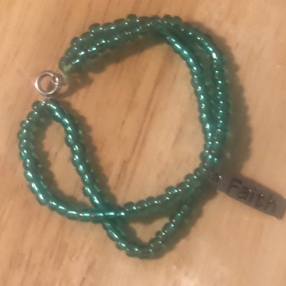 Hand Made double beaded bracelet w/ “Faith” charm.